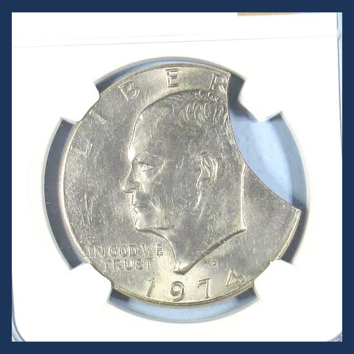 1974 Ike Dollar: Clipped Planchet
