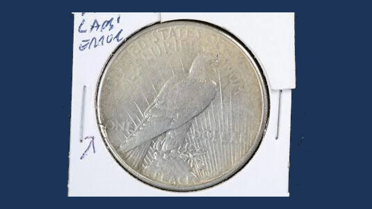 1935 Peace Silver Dollar: Lamination / Split Planchet