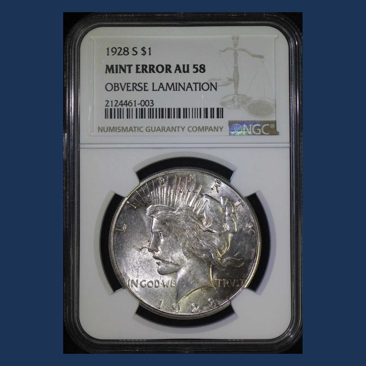 1928 Peace Dollar: Lamination