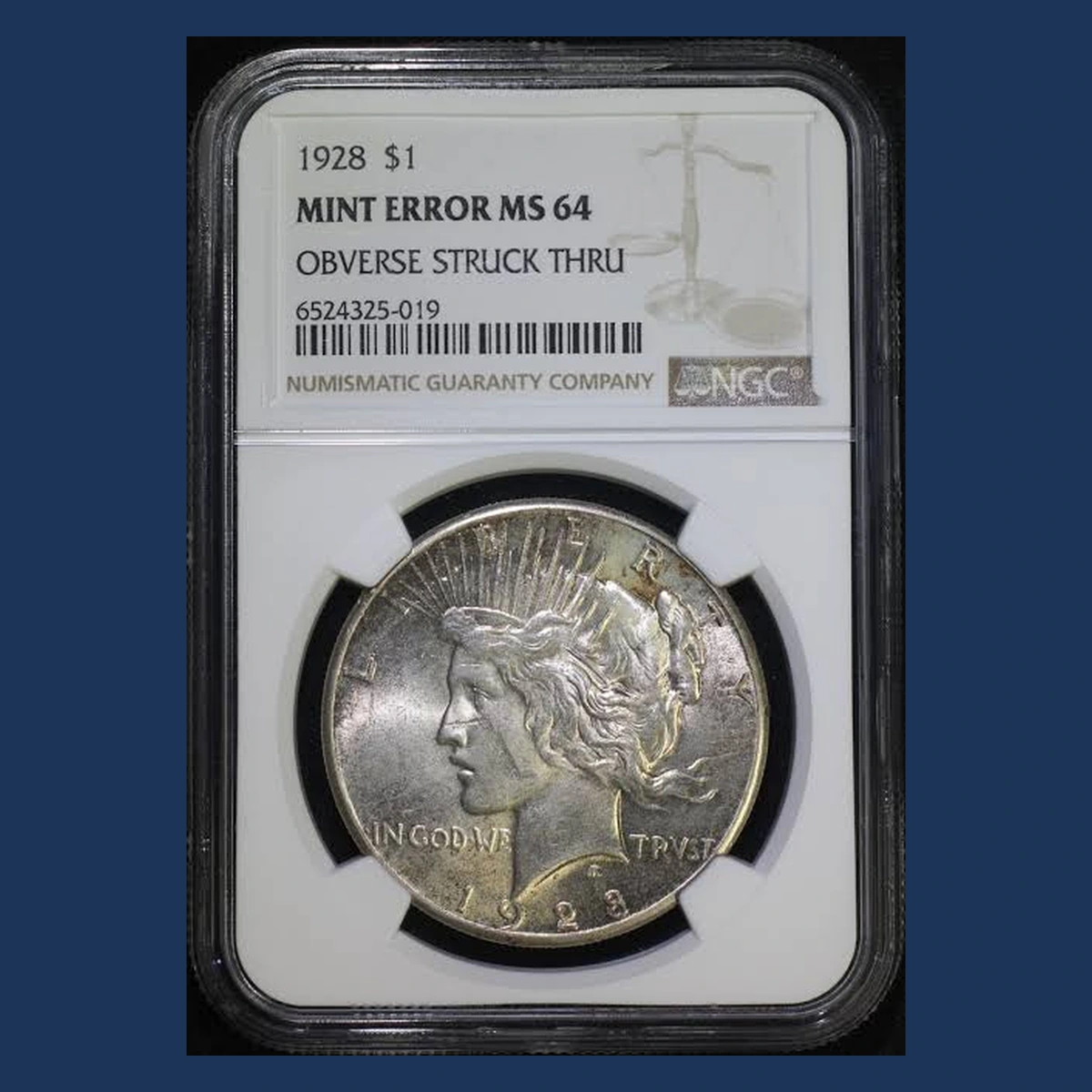 1928 Peace Dollar: Struck Through