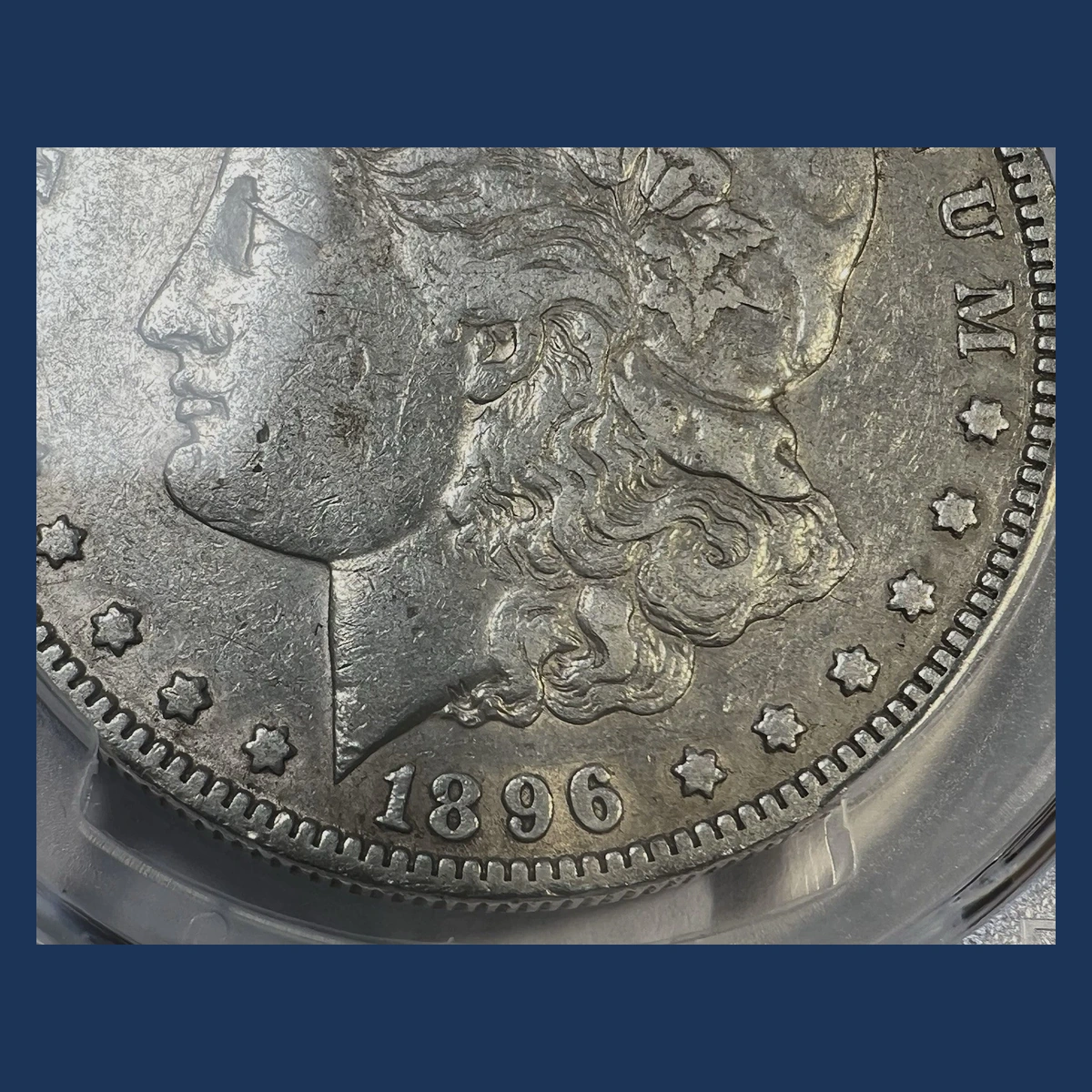 1896 Morgan Dollar: Repunched Date