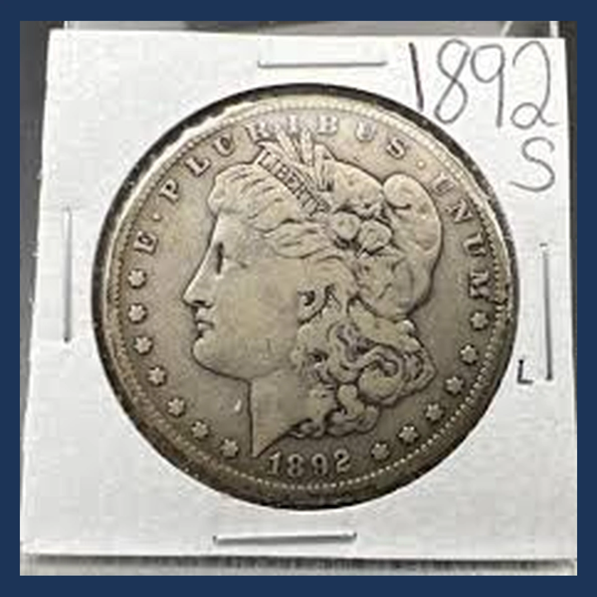 1892 Morgan Silver Dollar: Lamination / Split Planchet