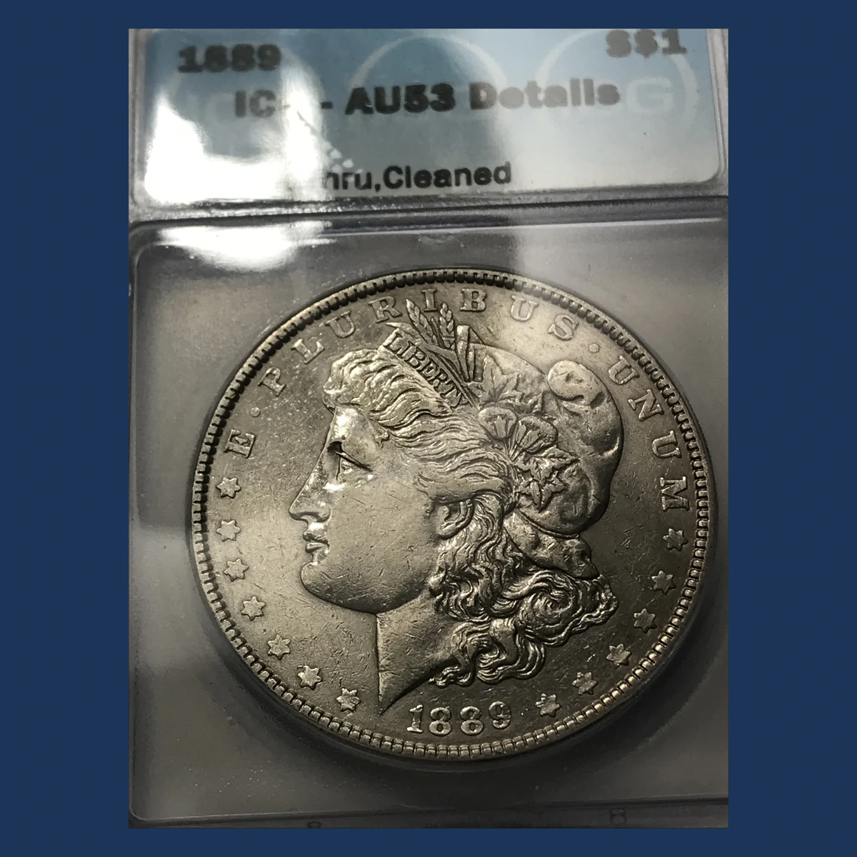 1889 Morgan Dollar: Struck Through