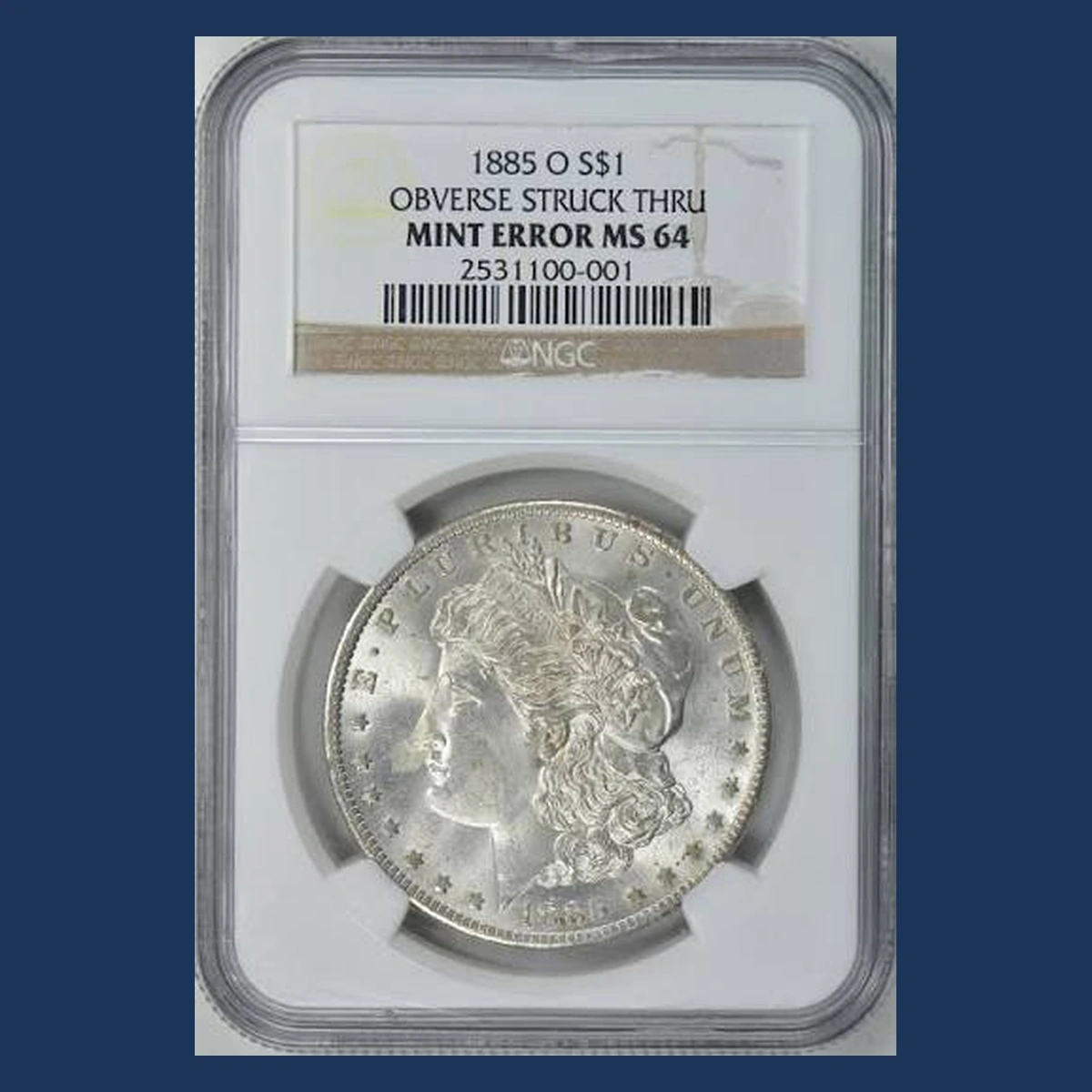 1885 Morgan Dollar: obverse strike-through
