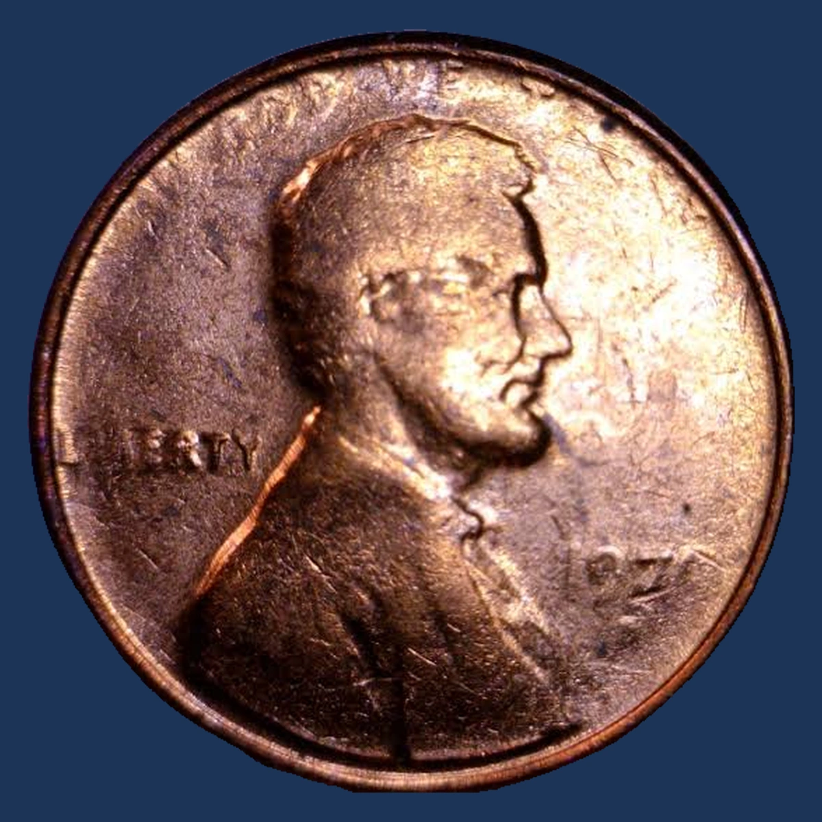 1970 Lincoln Cent (Modern): strike through a coin cap