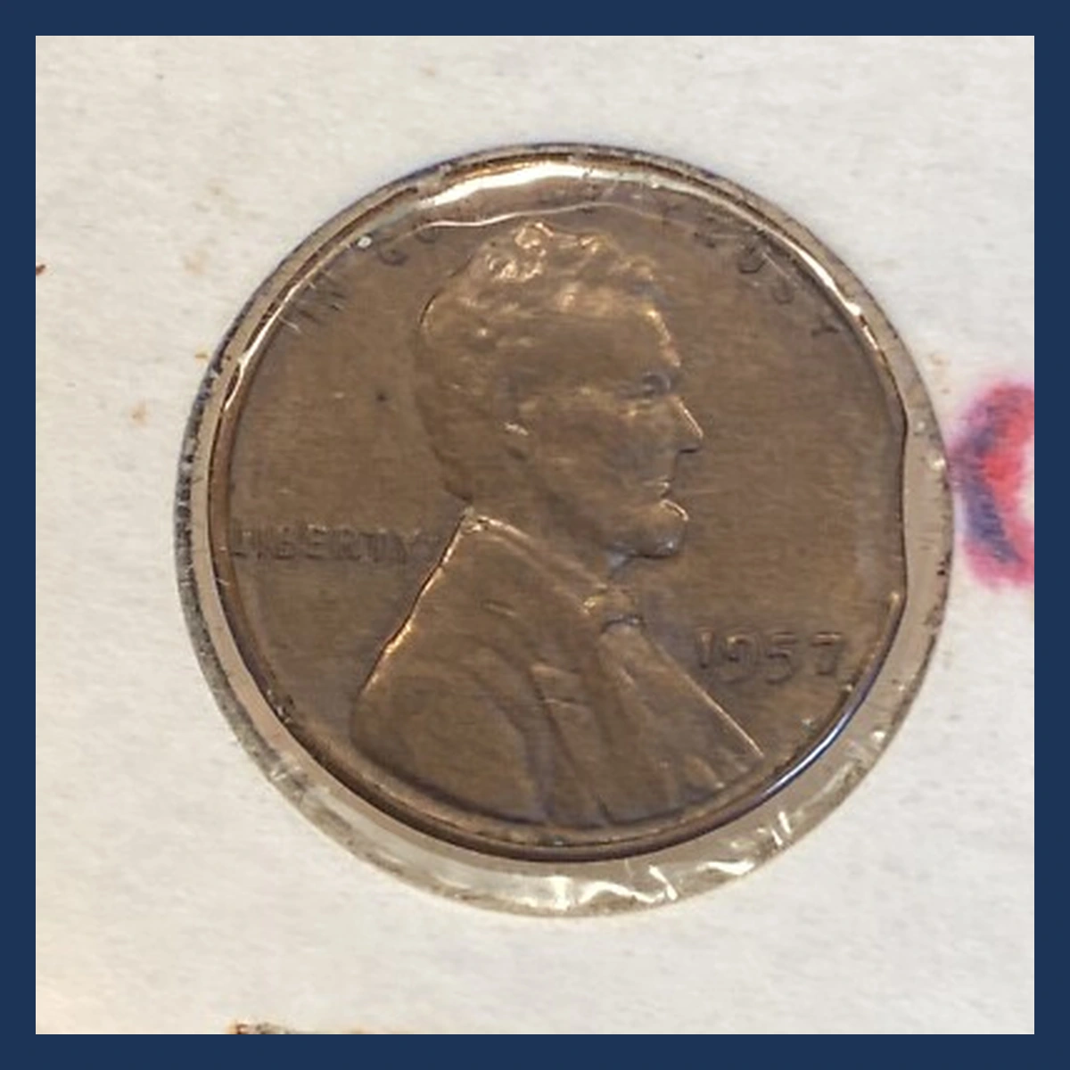 1957 Wheat Penny: Clipped Planchet