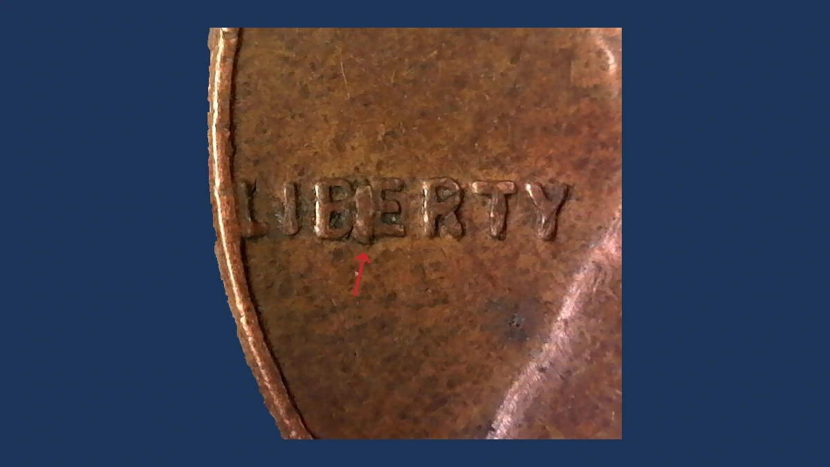 1957 Wheat Penny: BIE Die Break