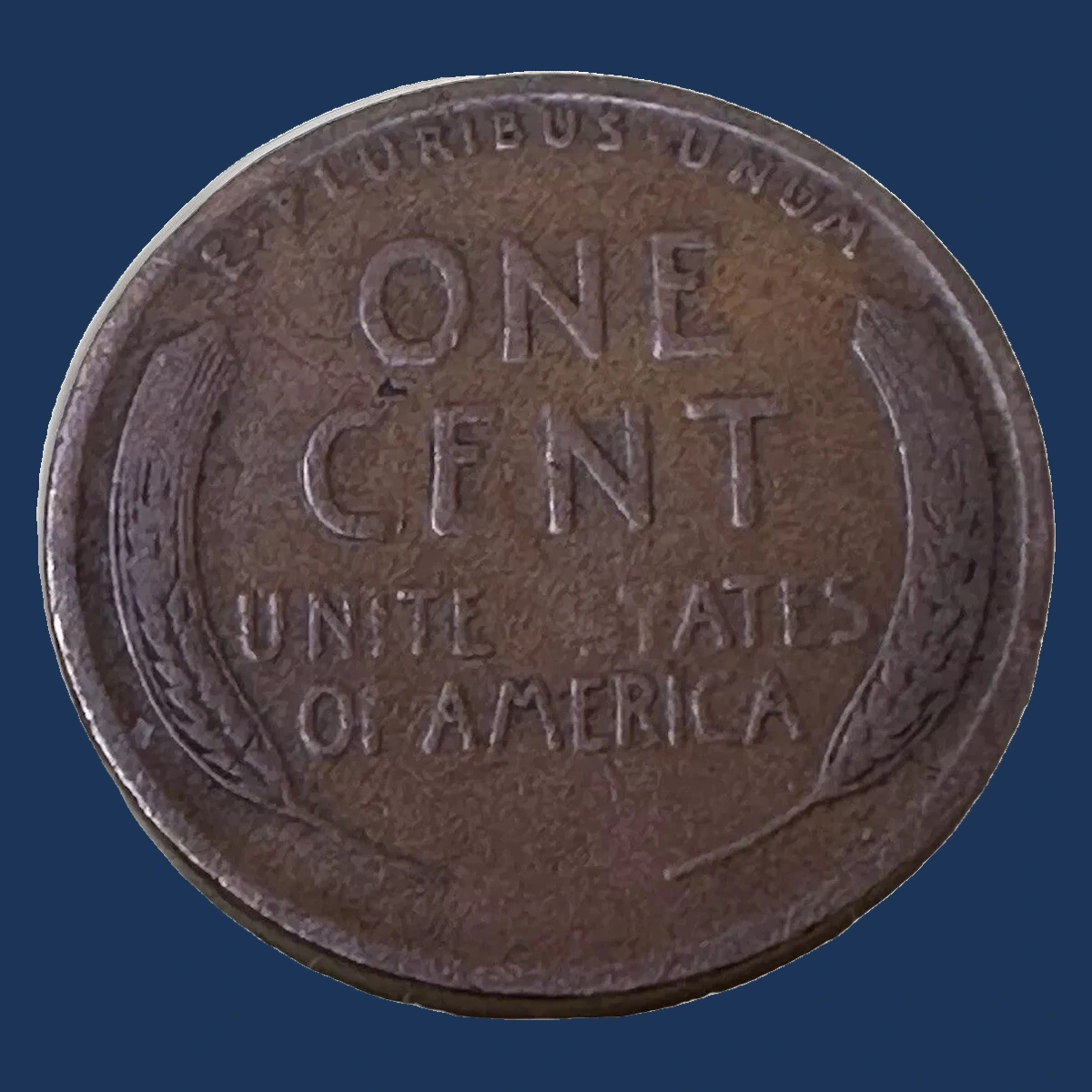 1928 Wheat Penny: Struck-Through Error