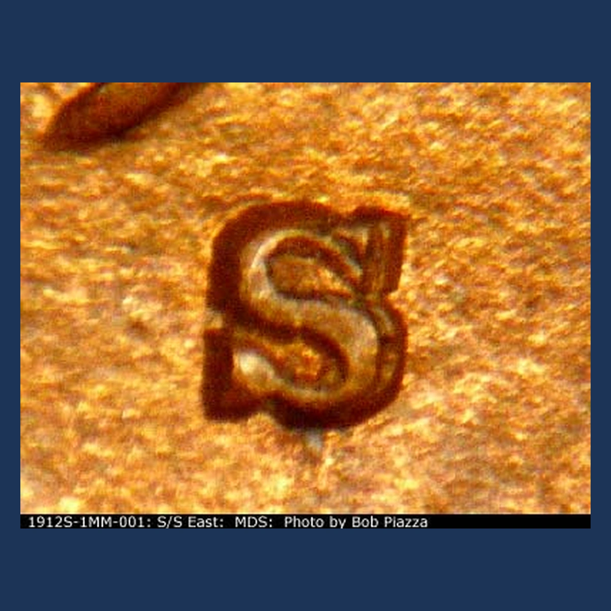 1912 Wheat Penny: Repunched Mintmark