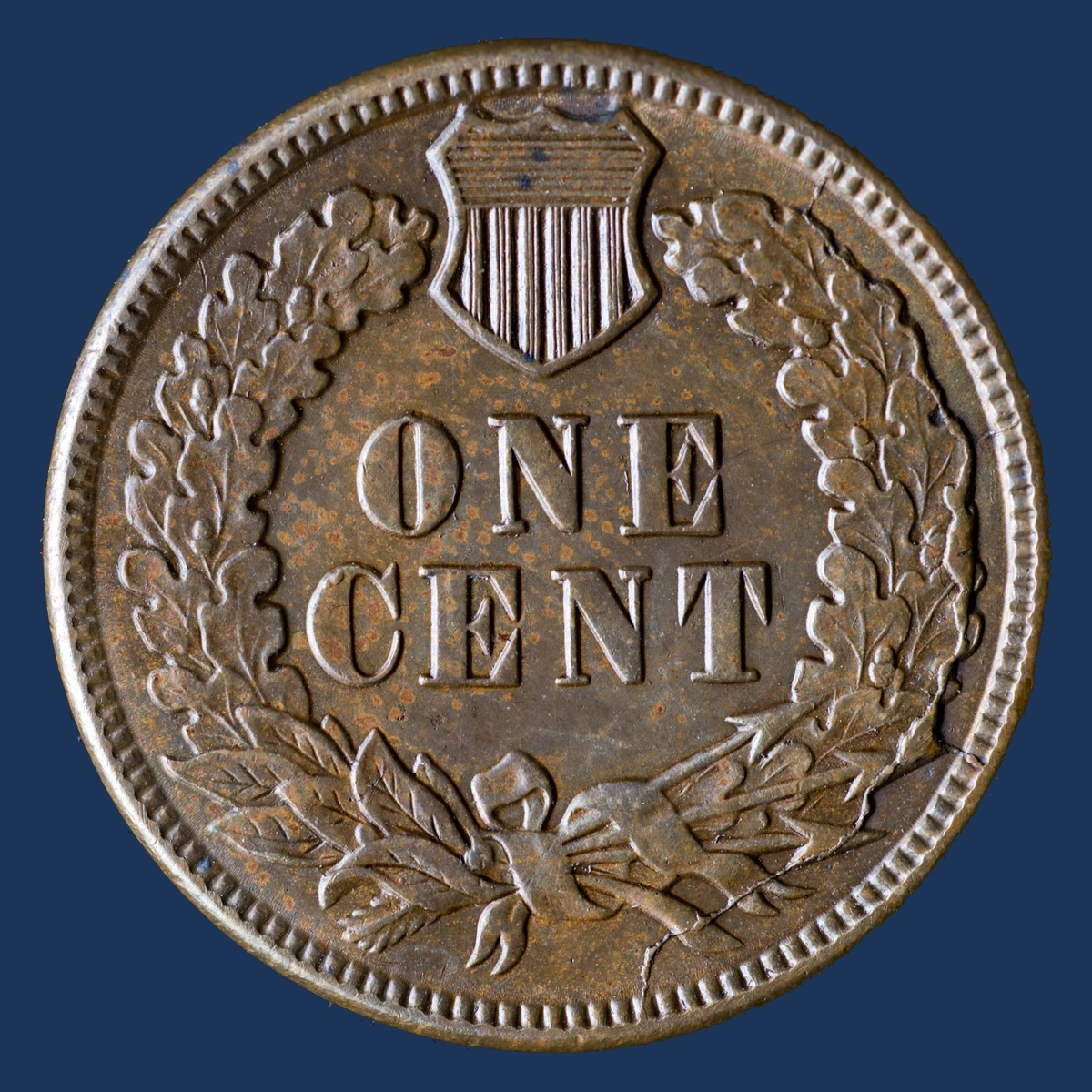 1887 Indian Head Penny: Die Break / Cud