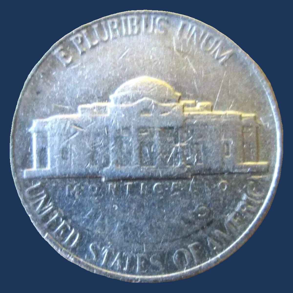 1995 Jefferson Nickel: Struck through capped die