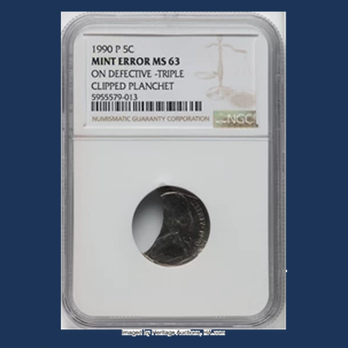 1990 Jefferson Nickel: Defective triple-clipped blank