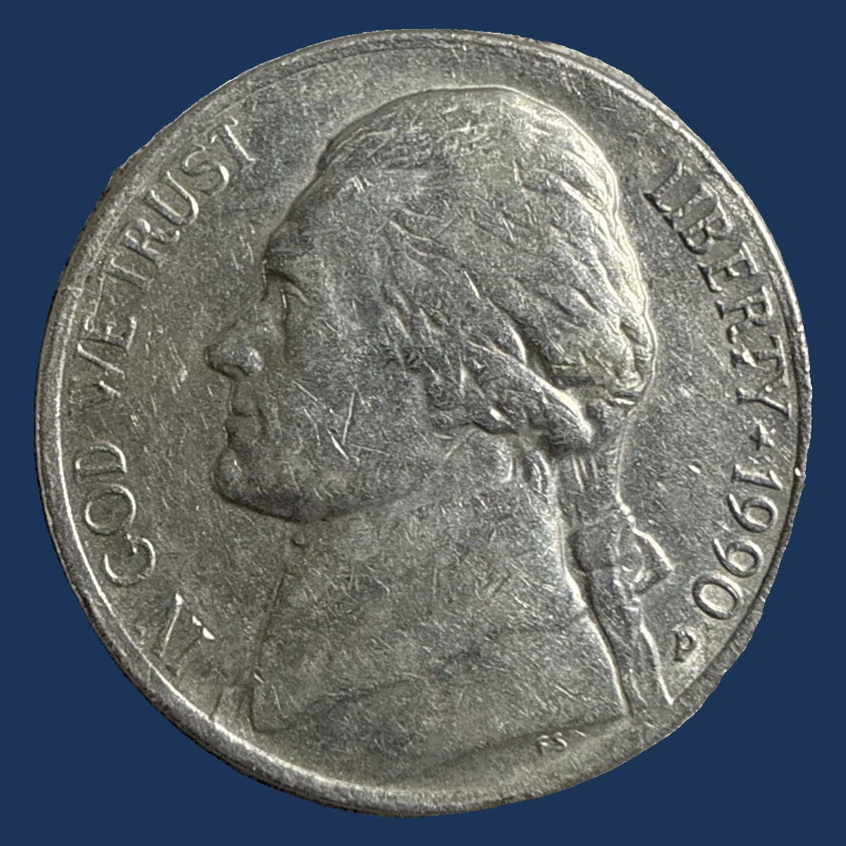 1990 Jefferson Nickel: grease strike-through