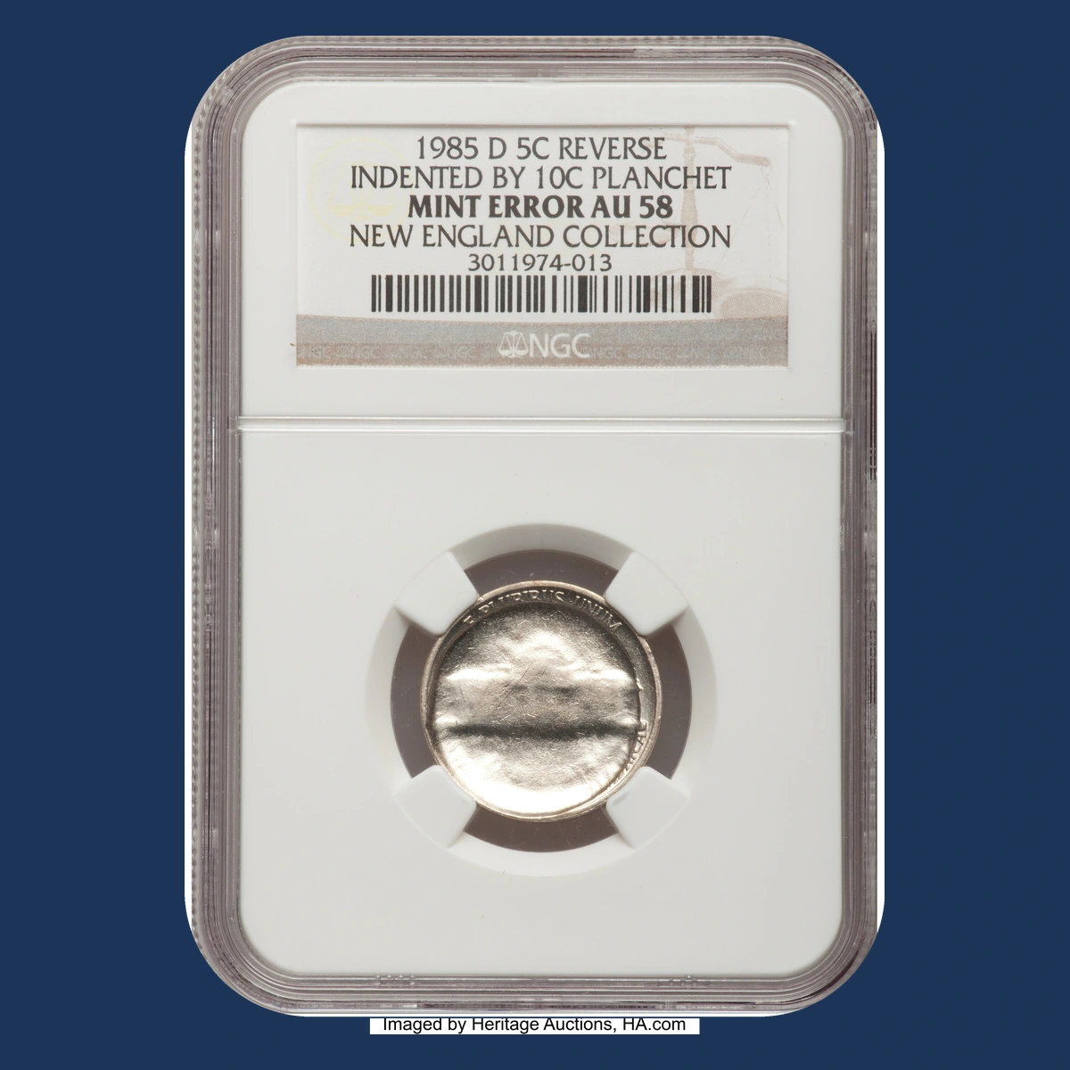 1985 Jefferson Nickel: Indented by dime blank