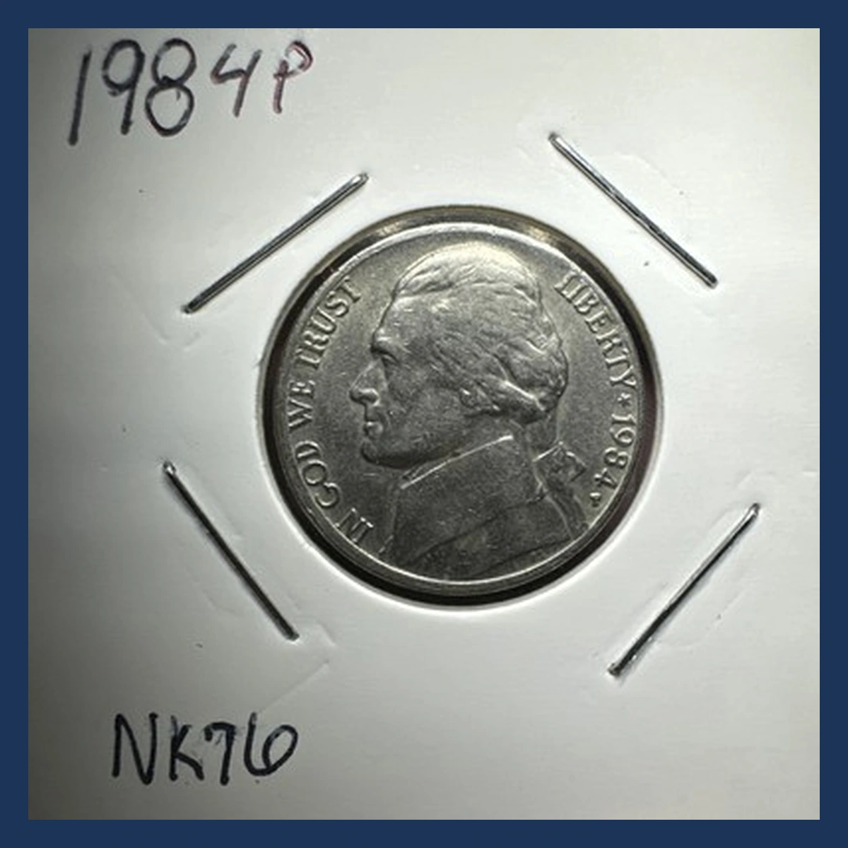 1984 Jefferson Nickel: die clash through the neck and fields