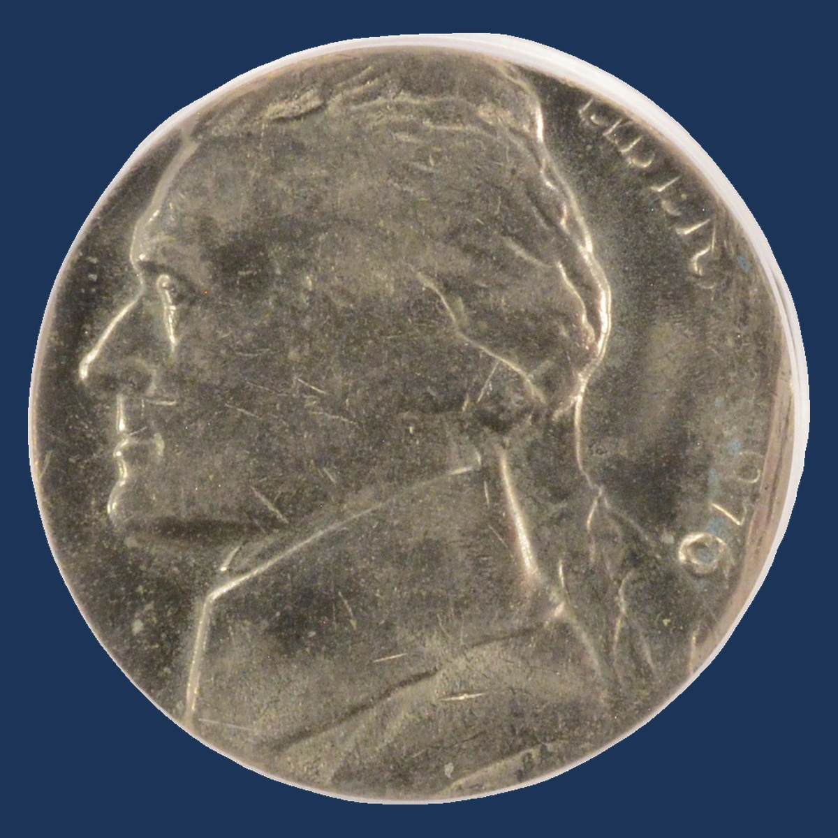 1976 Jefferson Nickel: Struck on clad dime blank