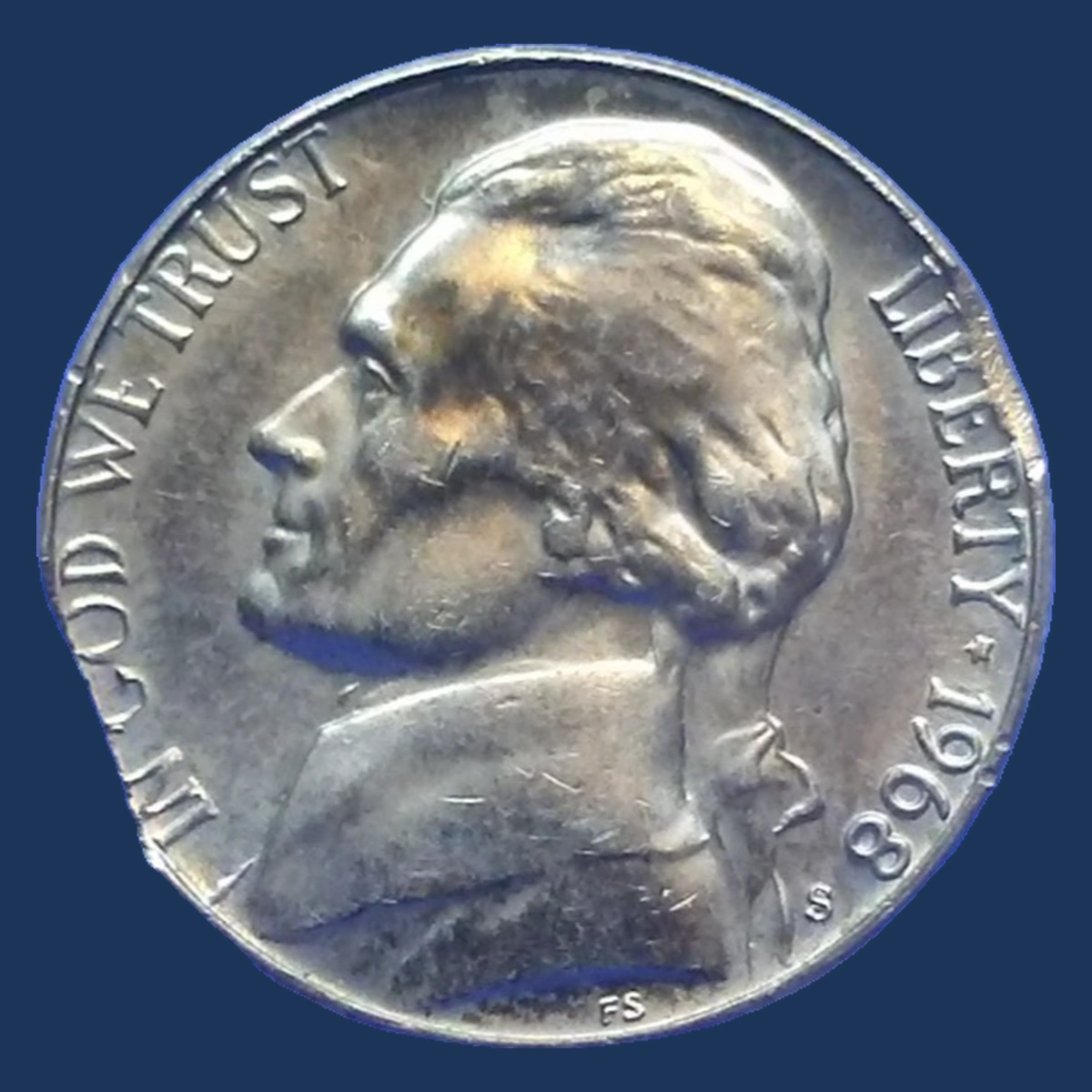 1968 Jefferson Nickel: Curved clipped planchet