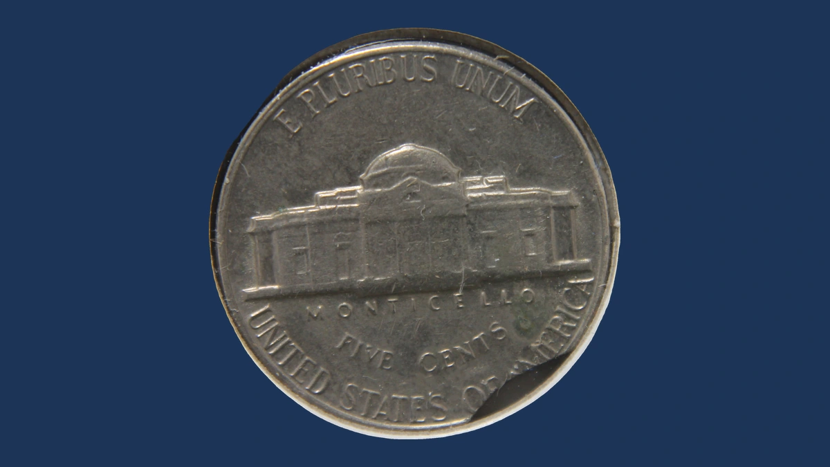 1967 Jefferson Nickel: Incomplete and curved clip