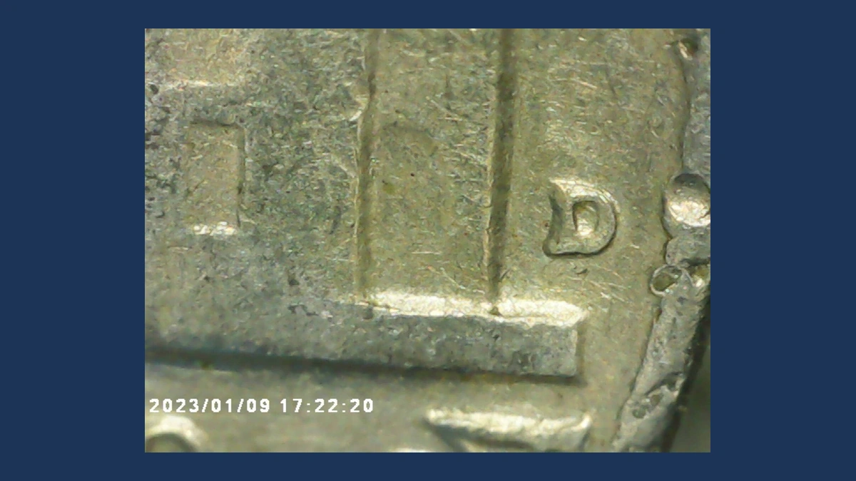 1959 Jefferson Nickel: Repunched Mintmark