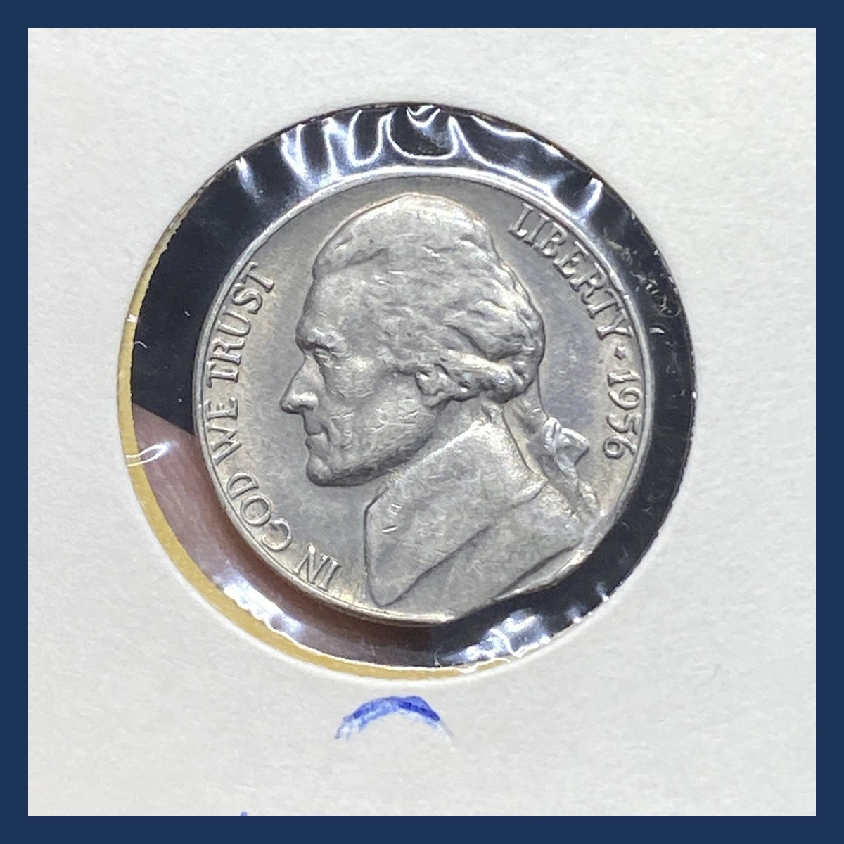 1956 Jefferson Nickel: Curved clipped planchet