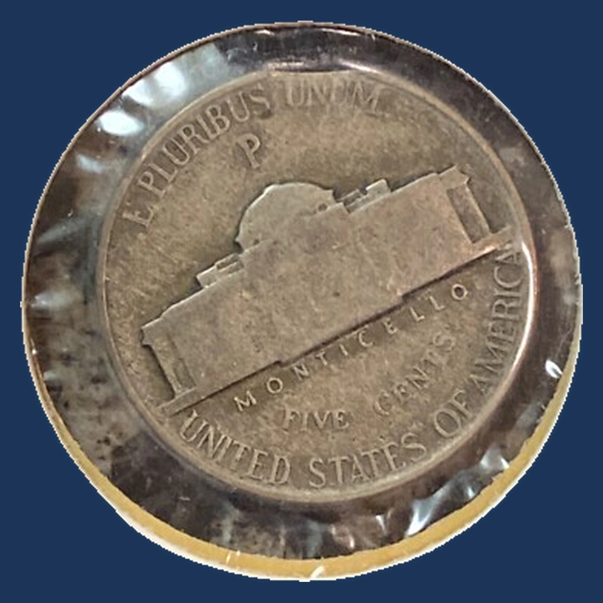 1944 Jefferson Nickel: Curved clipped planchet