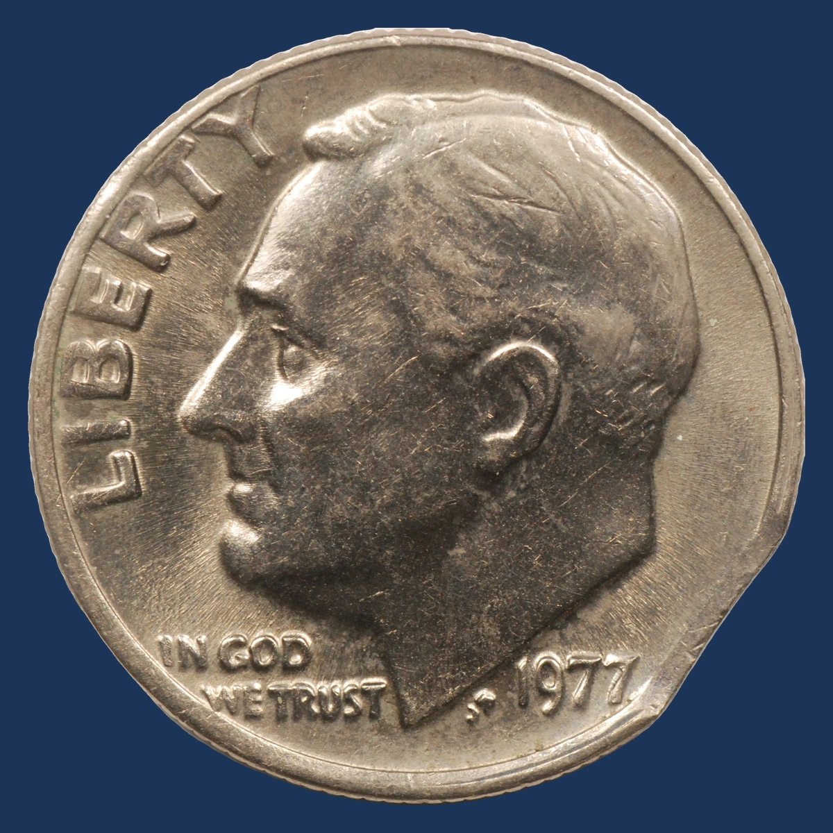 1977 Roosevelt Dime: Clipped Planchet