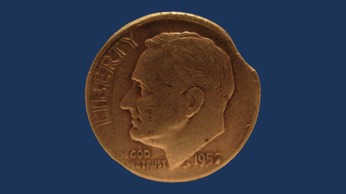 1957 Roosevelt Dime: Clipped Planchet