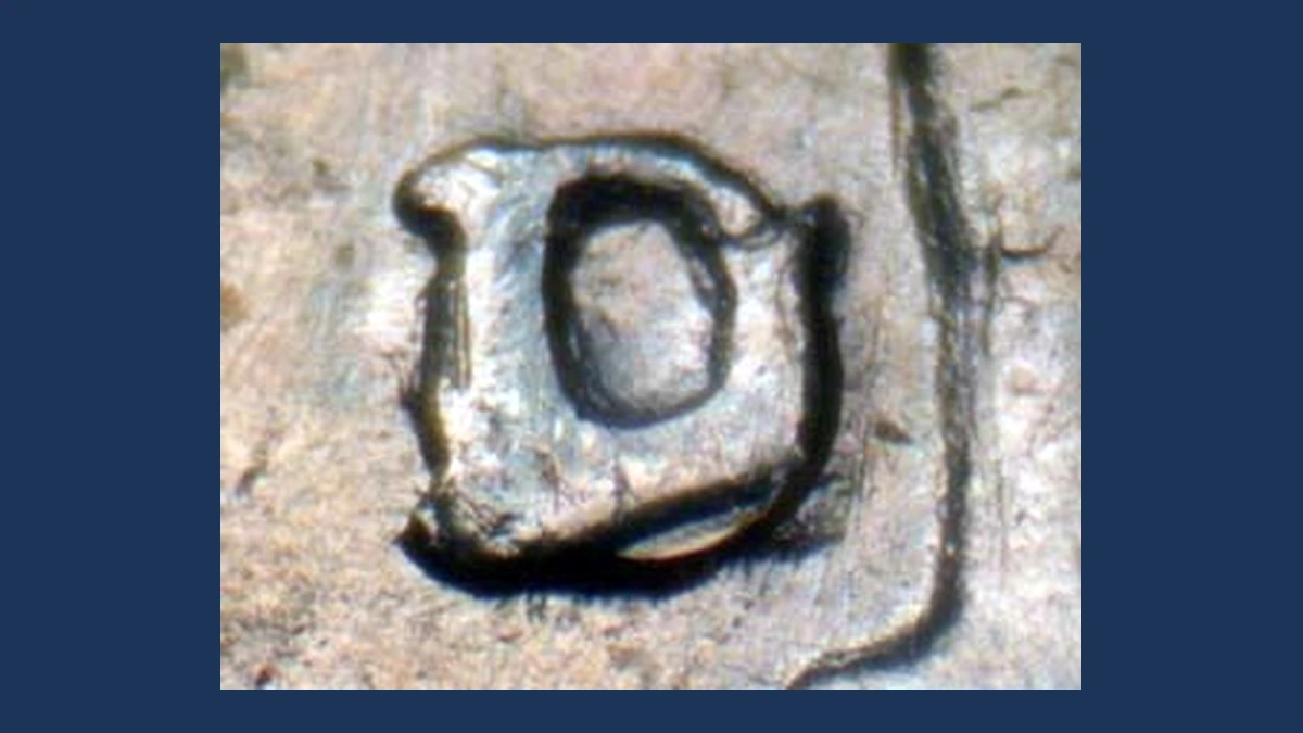 1953 Roosevelt Dime: D Over a Sideways D