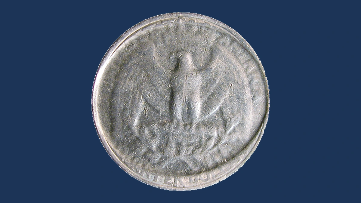 1998 Washington Quarter: strike through an elliptical clad layer