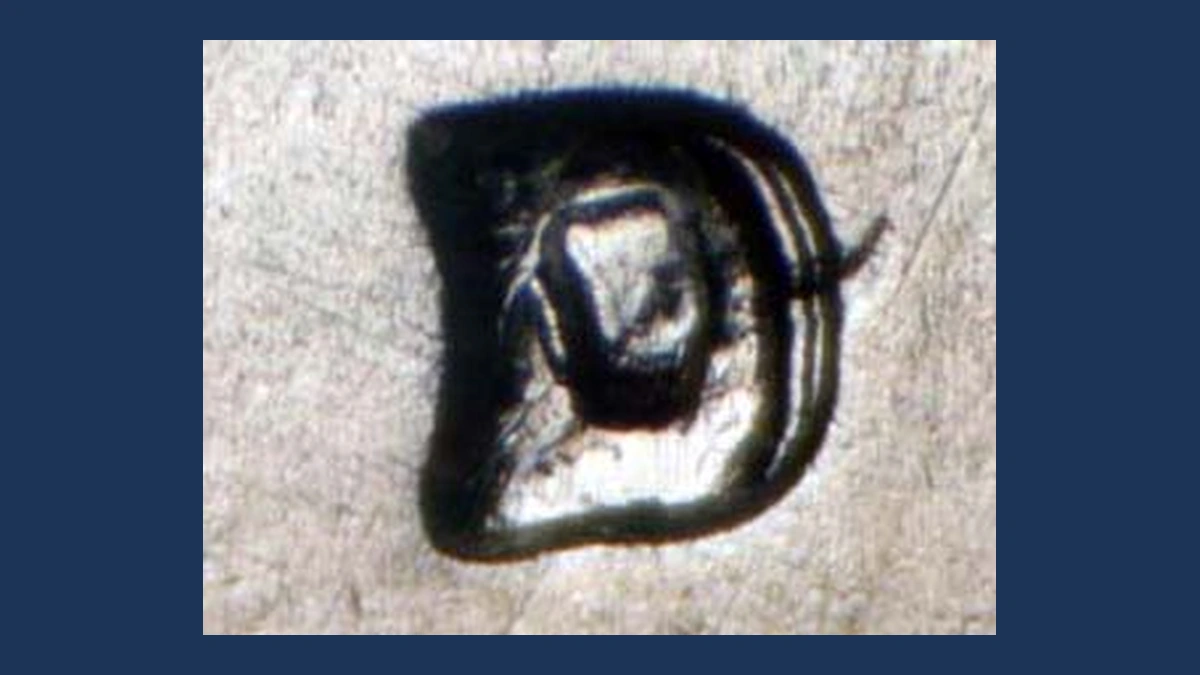 1961 Washington Quarter: Repunched Mintmark