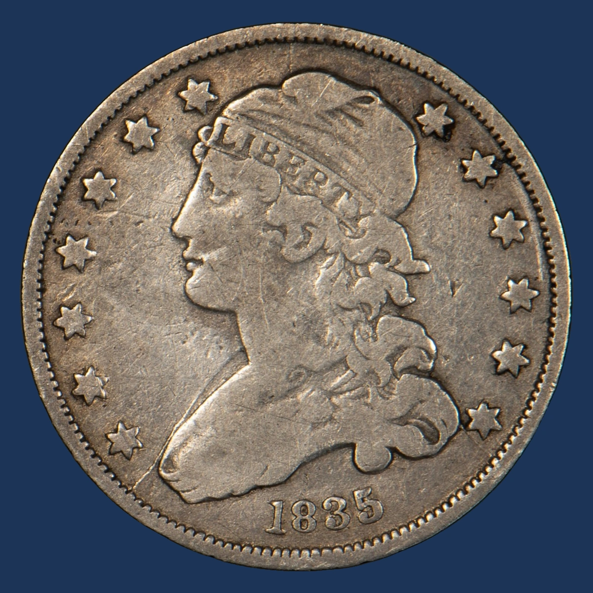 1835 Capped Bust Quarter: Die Break / Cud