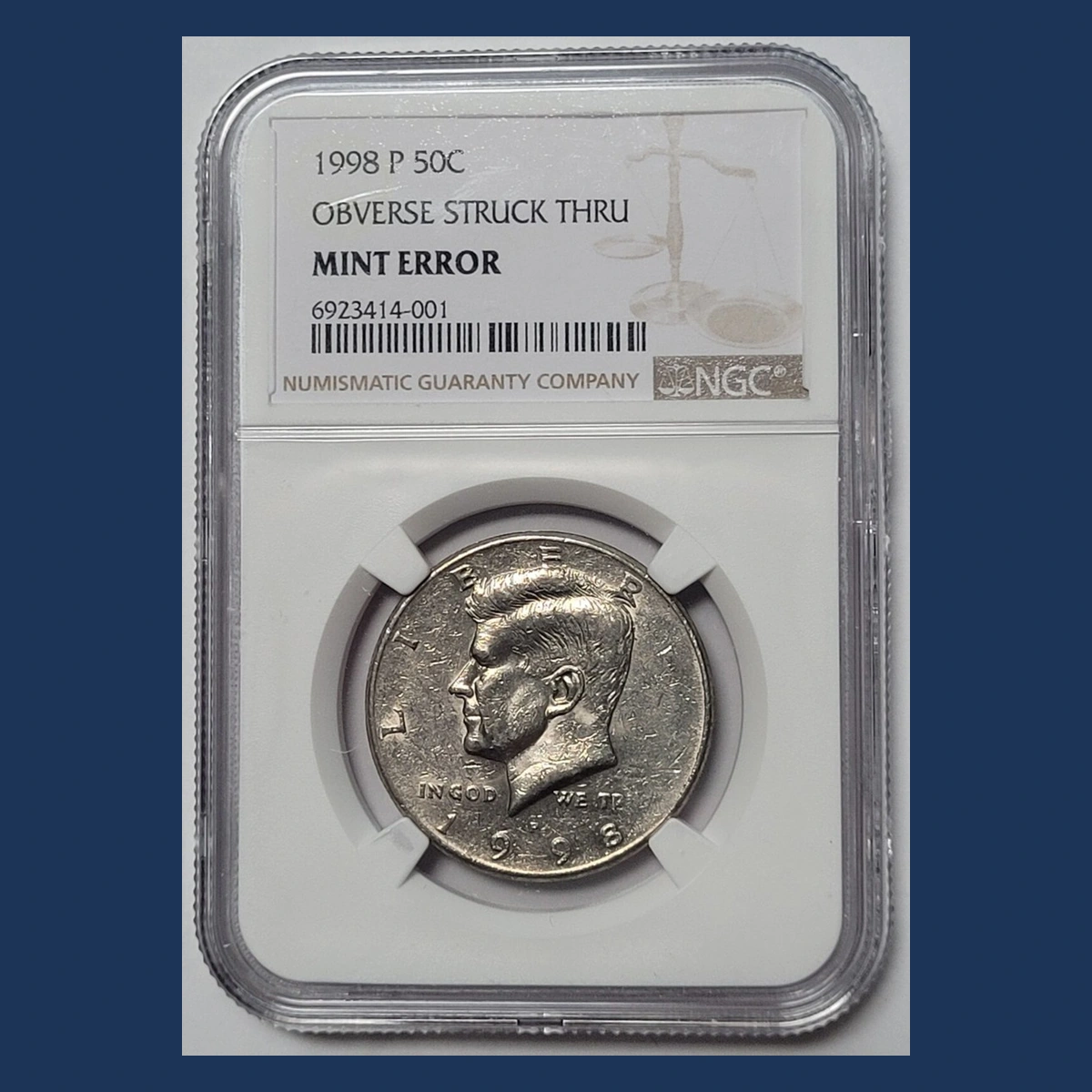 1998 Kennedy Half Dollar: obverse strike-through