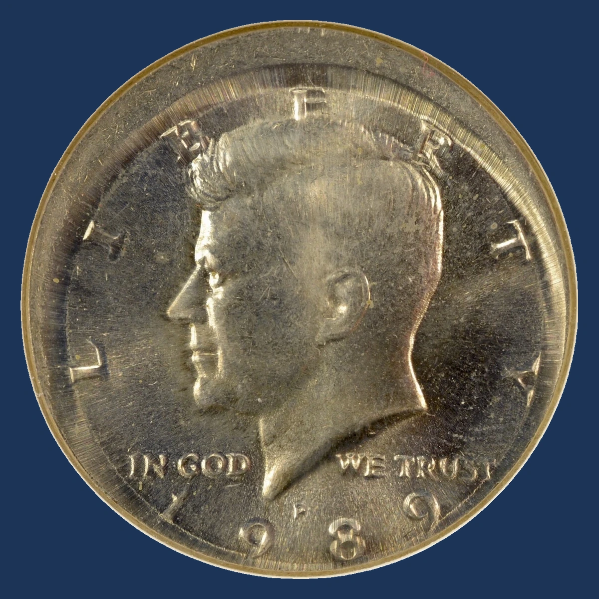 1989 Kennedy Half Dollar: broadstrike