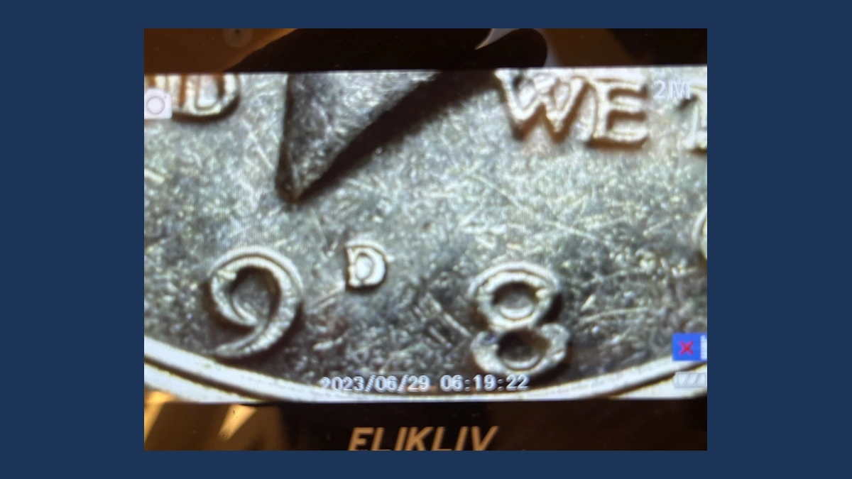 1989 Kennedy Half Dollar: Repunched Mintmark