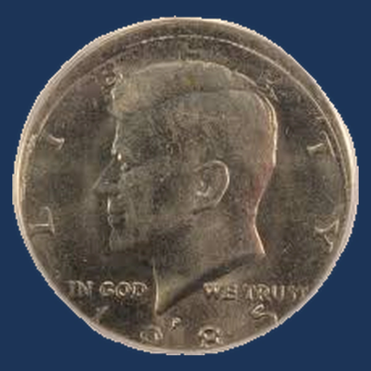 1985 Kennedy Half Dollar: Off-Center Strike