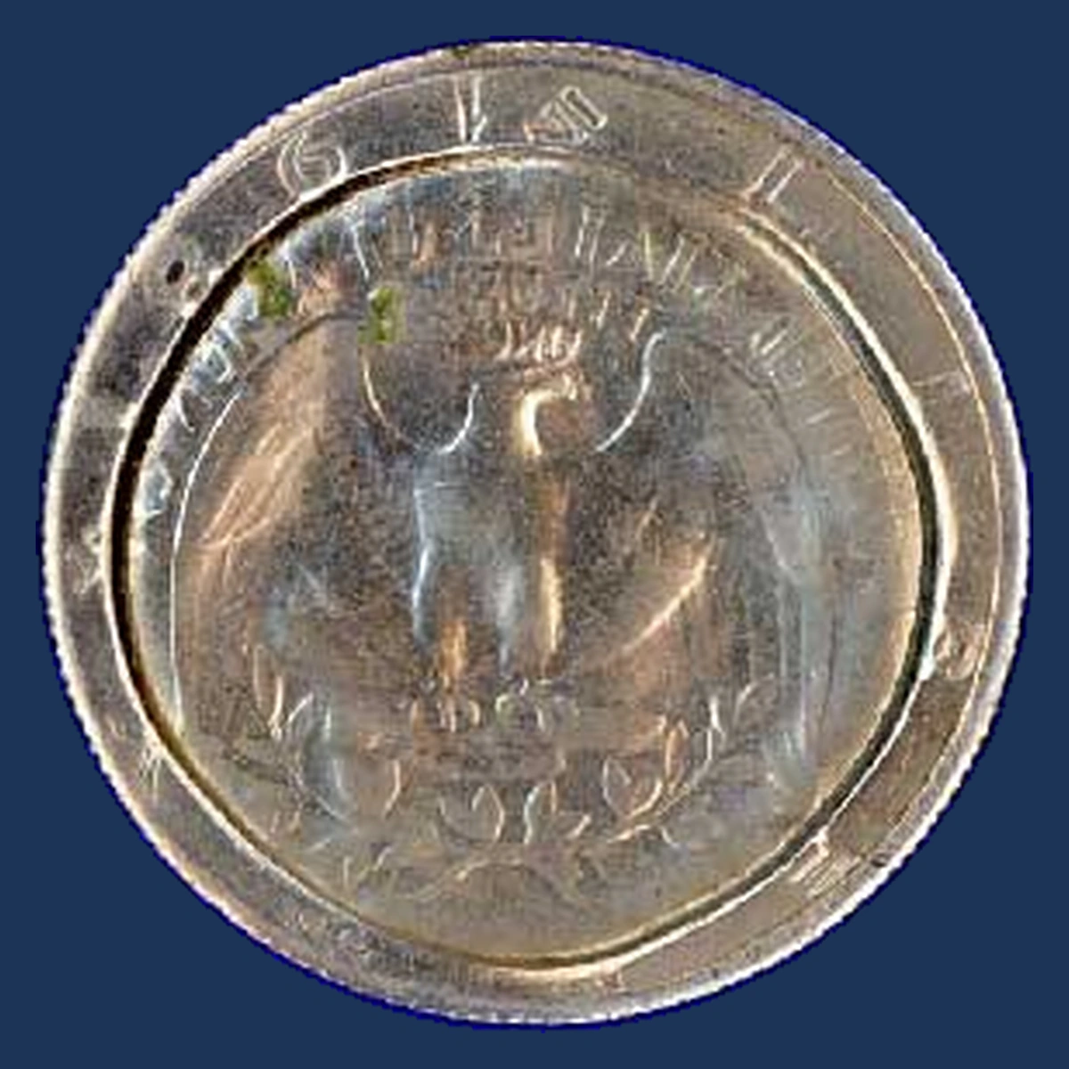 1981 Kennedy Half Dollar: quarter-reverse brockage