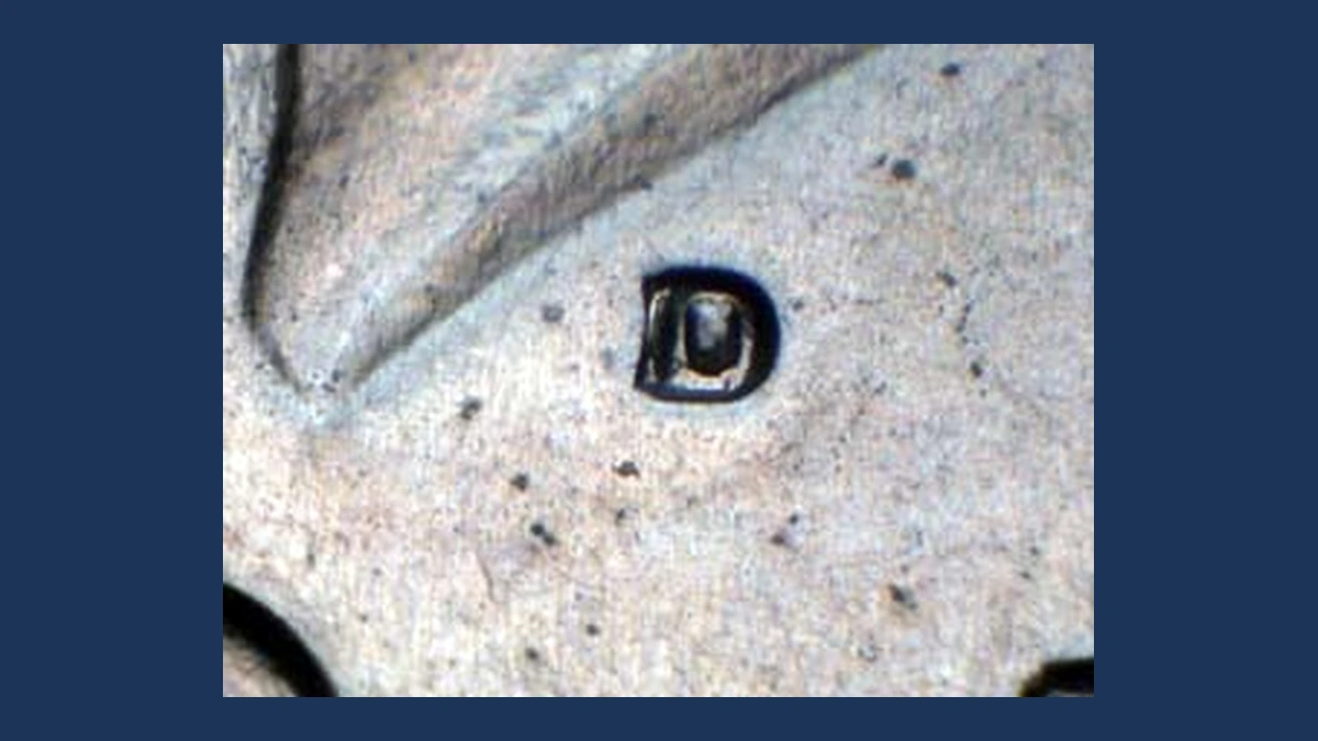 1971 Kennedy Half Dollar: Repunched Mintmark