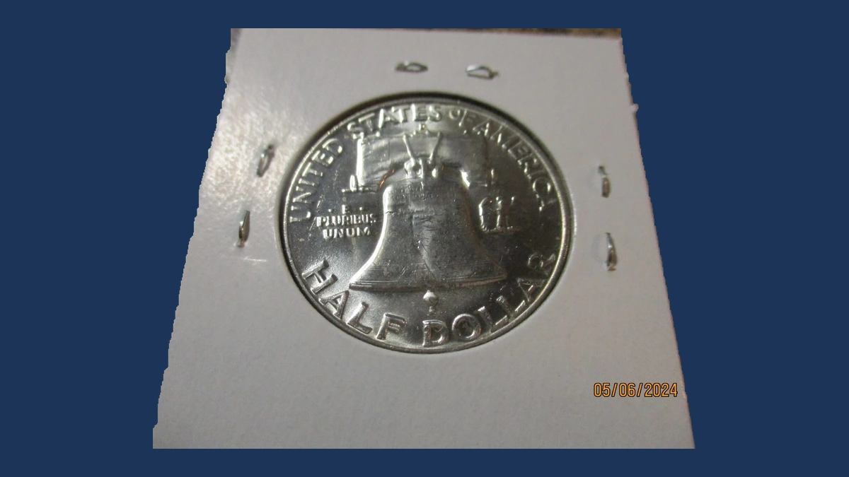 1958 Franklin Half Dollar: Repunched Mintmark