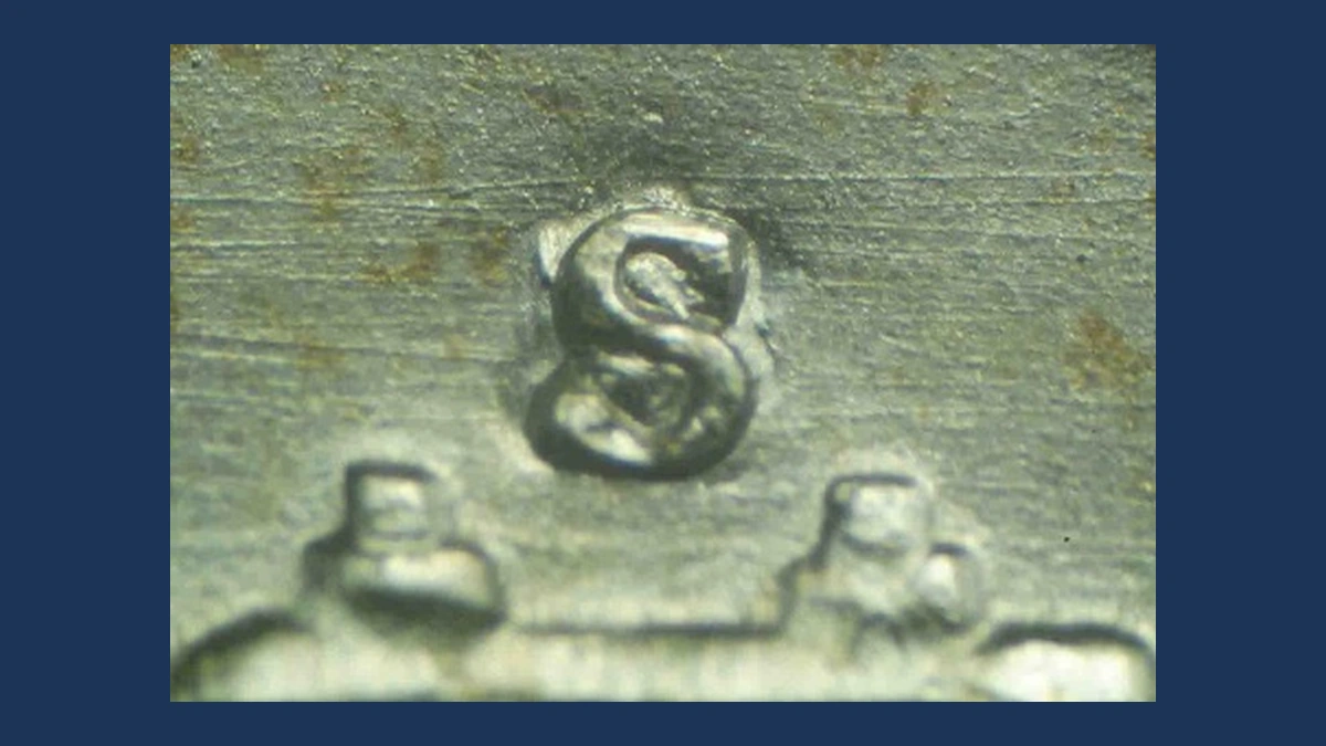 1953 Franklin Half Dollar: Repunched Mintmark